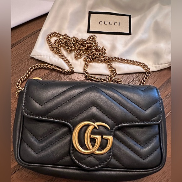 Gucci Handbags - GUCCI GG MARMONT SUPER MINI BAG.